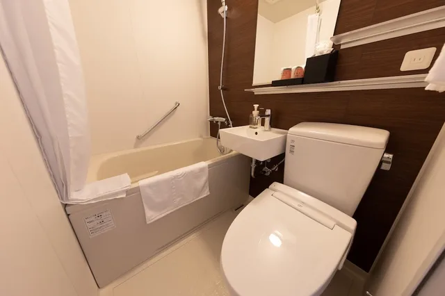 غرفة عائلية بسريرين منفصلين في الملحق، Central Hotel Takeo 3/3