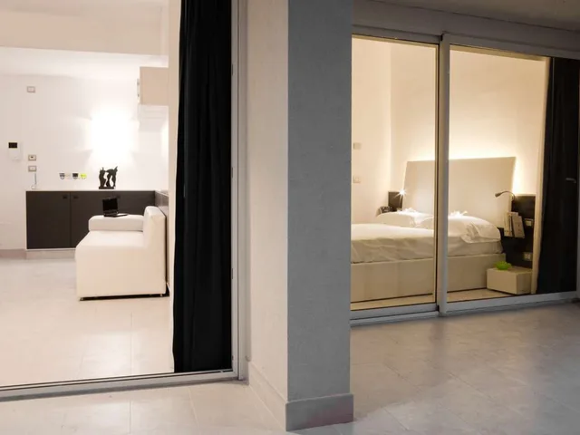 غرفة بشرفة، Lungotevere Suite 1/1