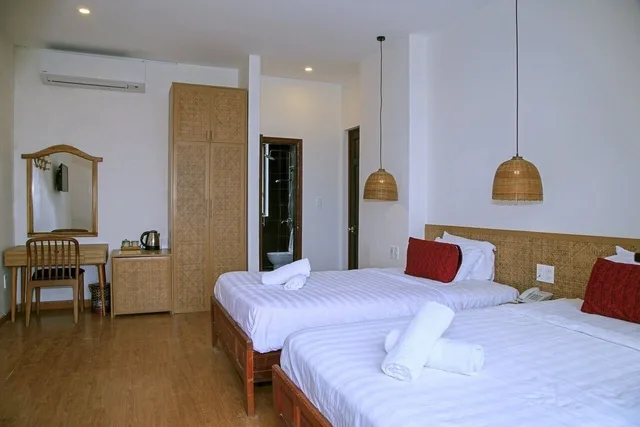 غرفة بسريرين منفصلين بشرفة، Gia Huy Riverside Hotel Hoi An 3/10