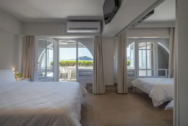 غرفة قياسية رباعية بسرير كوين وسريرين منفصلين، Nelly's Apartments 1/2