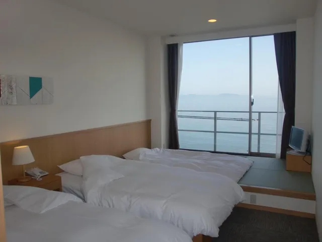 غرفة ثلاثية بإطلالة على البحر، Bayside Square Kaike Hotel 3/4