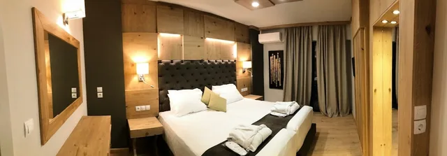 جناح جونيور بسريرين منفصلين مع أريكة، Elmi Suites 6/10