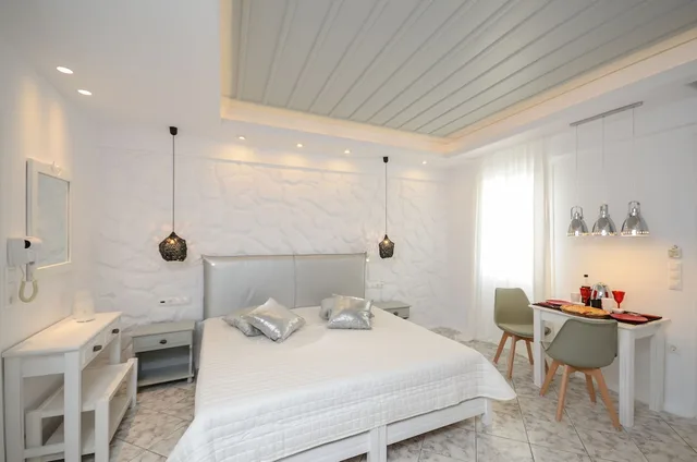 جناح جونيور، Naxos Evilion 8/10