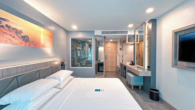 غرفة ديلوكس بسرير كينج بشرفة، Clarian Hotel Beach Patong 3/10