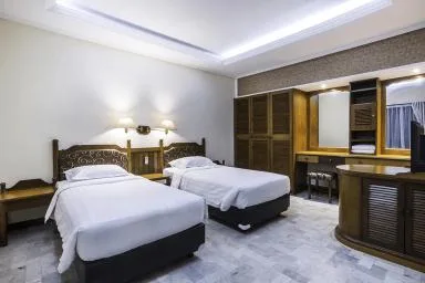 غرفة ديلوكس بسرير مزدوج أو سريرين منفصلين بإطلالة على الحديقة، Bali Bungalo Hotel 1/1