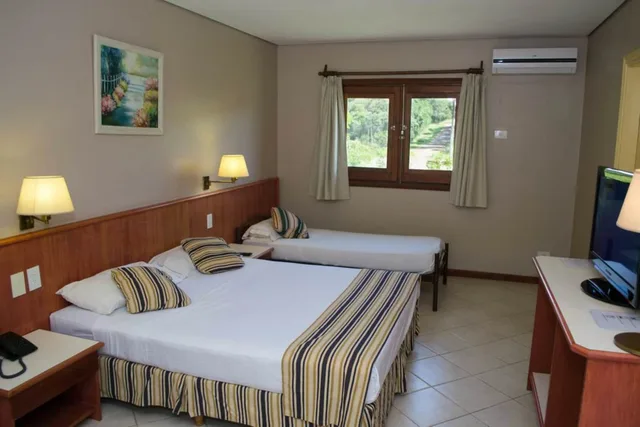 غرفة عائلية ثلاثية بسرير مزدوج وسرير فردي، Marcopolo Suites Iguazu 5/10