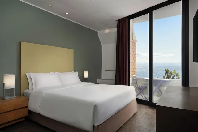 جناح كلاسيكي بسرير كينج بشرفة بغرفة نوم واحدة، Four Points By Sheraton Catania Hotel And Conference Center 1/8