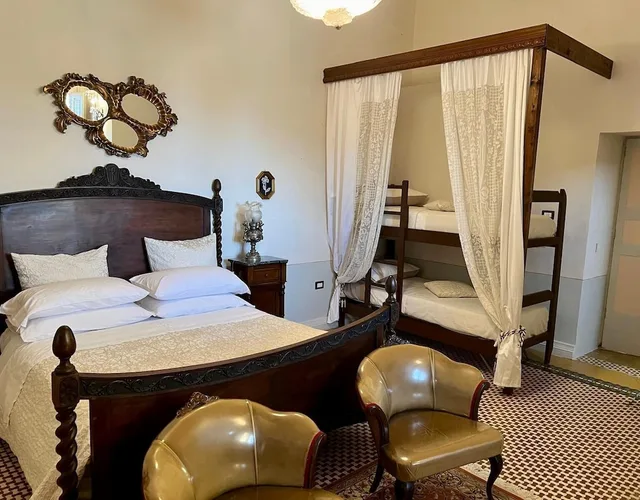 غرفة رباعية بسرير كوين وسرير بطابقين، Palazzo De Castro 5/10