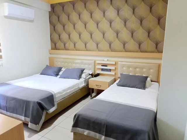 غرفة بسرير كوين وسرير فردي، Gunduz Otel 2/4