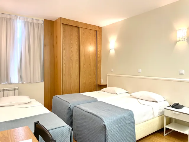 غرفة سوبيريور ثلاثية بسرير فردي، Universal Hotel 3/5