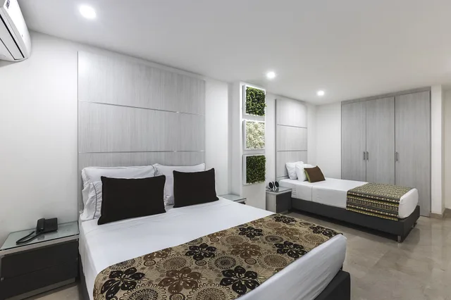 غرفة ثلاثية بسرير مزدوج وسرير فردي، Hotel Madeiro 7/10