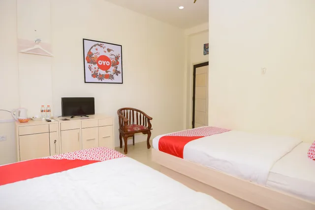غرفة ديلوكس بسريرين منفصلين، Hotel Capital O 854 Ub Caisar Hotel 3/4