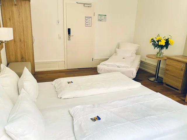 غرفة قياسية ثلاثية بسرير كينج مع أريكة، Hotel Perkeo 3/5