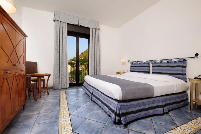 غرفة ديلوكس ثلاثية بسرير كينج، Alberi del Paradiso Hotel 3/10