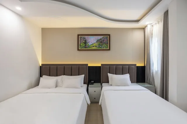 غرفة عائلية ثلاثية بسرير كوين وسرير فردي، A25 Hotel - 65G Nguyen Thai Hoc 2/10