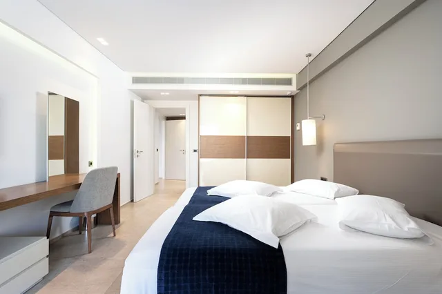 جناح تنفيذي بسريرين منفصلين بغرفة نوم واحدة مع أريكة، Astir Odysseus Kos Resort and Spa 2/10