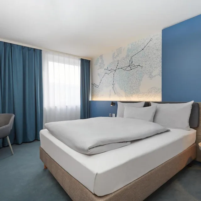 غرفة كومفورت بسرير كينج، H4 Hotel Leipzig 1/10