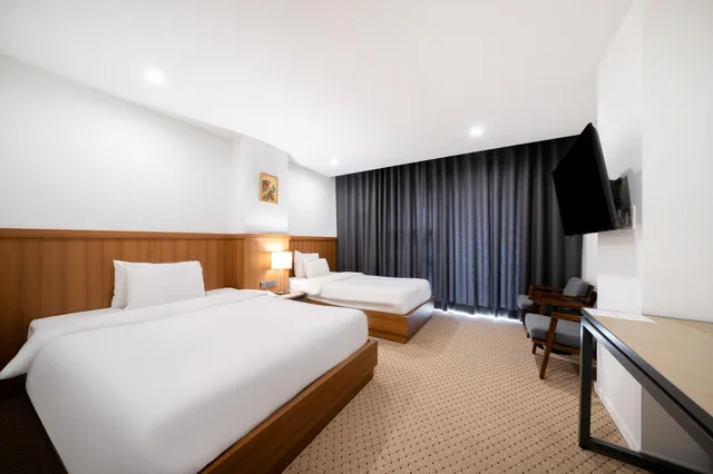 غرفة ديلوكس بسريرين منفصلين وسرير مزدوج وسرير فردي، Hotel Davin 1/2