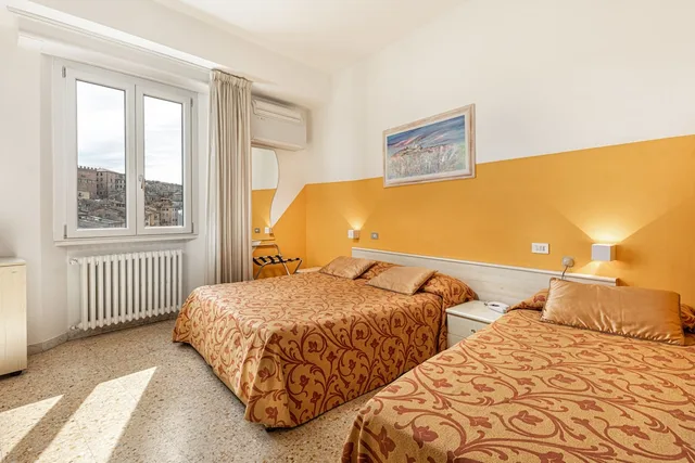 غرفة رباعية بأربعة أسرّة، Hotel Minerva 2/5