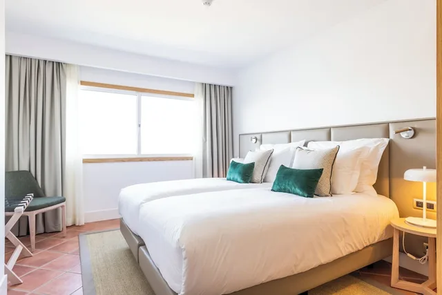 شقة سوبيريور بسرير كوين وسريرين منفصلين بغرفتي نوم، The Patio Suite Hotel 1/4