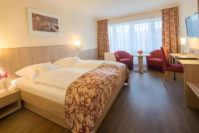 غرفة اقتصادية عائلية، Room in B&B - Studio for 2 People in Hamburg Mitte, Cozy and Modern 1/2