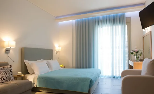 Room, Triple, Double Bed, Sofa, Grand Theoni Hotel Suites And Spa 1/6