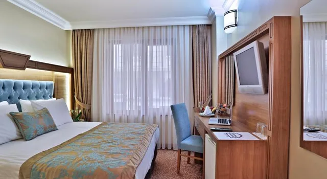 غرفة ديلوكس بسرير مزدوج بشرفة، Budo Hotel 1/1