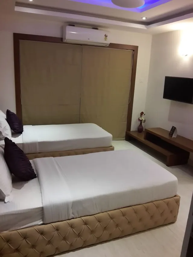 غرفة تنفيذية بسريرين مزدوجين بغرفة نوم واحدة، Icon Suites By Bhagini 1/9