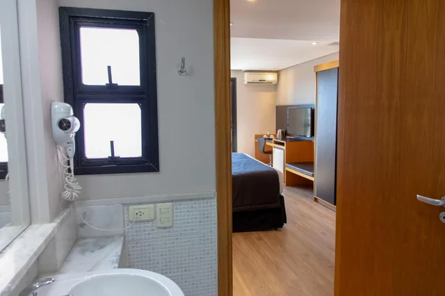 غرفة فاخرة عائلية بسرير مزدوج وسرير فردي، Slaviero Hotel Curitiba Batel 5/5