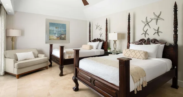 2 Bedrooms, Luxury, Suite, 2 Double Beds, Partial Ocean View, Butler، Beaches Turks & Caicos 2/5