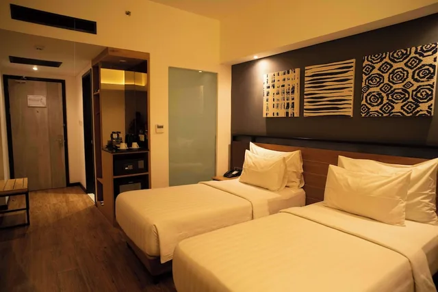 غرفة ديلوكس بسريرين منفصلين، Muraya Hotel Aceh 1/4