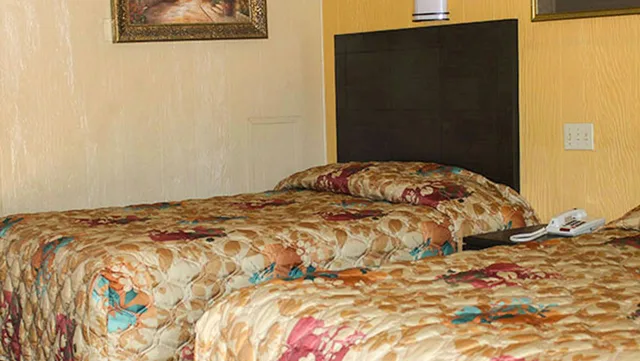 غرفة بسريرين مزدوجين، Charles Wesley Motor Lodge 1/2