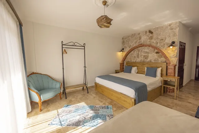 غرفة ثلاثية بسرير كينج بشرفة، Soleado Capadocia Hotel 2/6