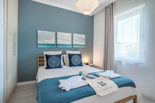 شقة عائلية بسرير كوين وسريرين منفصلين بإطلالة على البحر بغرفتي نوم بمطبخ، True Blue Boutique Hotel Kalkan 1/7