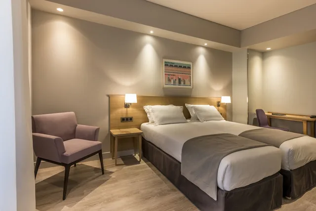 غرفة قياسية بسريرين منفصلين بإطلالة على الحديقة، Hotel Magellan 4/7