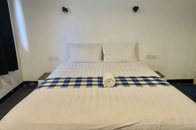 غرفة قياسية بسرير كوين، Taman Unique Hotel 4/10