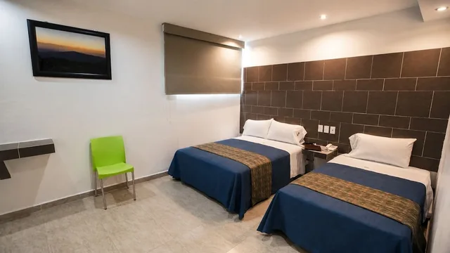 غرفة عائلية بسرير كينج وسرير فردي، First Inn Hotel and Business 5/10