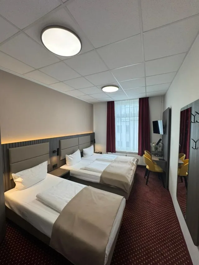 غرفة ثلاثية بسرير فردي، Lumen Am Hauptbanhof 5/10