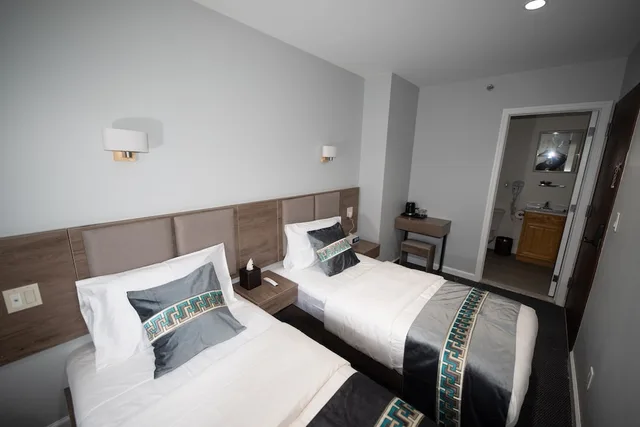 غرفة أساسية بسريرين منفصلين، Flushing Garden Hotel 1/3