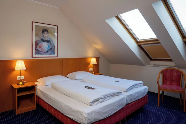 غرفة كومفورت رباعية بسريرين كوين، Hotel Glockenhof Eisenach 1/7