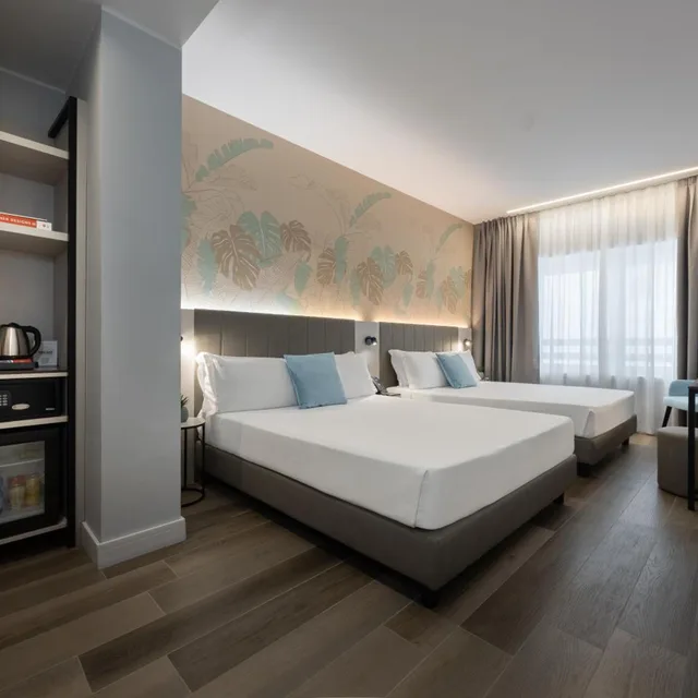 غرفة سوبيريور بسريرين كوين، iH Hotels Milano Centrale 3/10