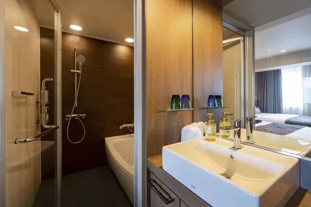 غرفة بريميير بسريرين كوين، Karaksa Hotel Grande Shin-Osaka Tower 4/4