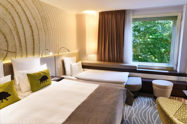 غرفة عائلية بسرير مزدوج مع أريكة، Steigenberger Airport Hotel 1/1