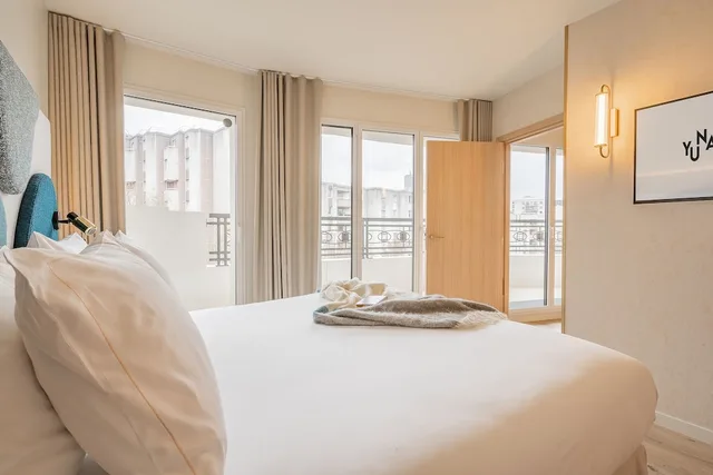شقة بريميوم بسرير كوين بشرفة بغرفة نوم واحدة مع أريكة، Yuna Porte Maillot - ApartHotel 9/10