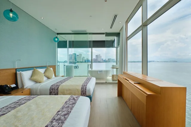 جناح سيغنتشر بسريرين كوين مع أريكة، Hotel H2o 1/6