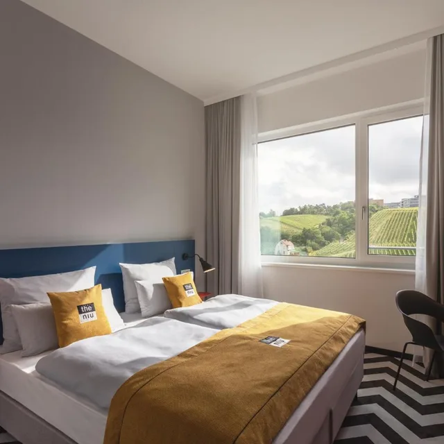 غرفة قياسية بسرير كينج وسرير كوين لذوي الإعاقة، Holiday Inn - the niu, Form Stuttgart Feuerbach, an IHG Hotel 1/6