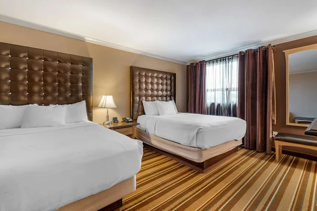 2 Rooms, Suite, 2 Queen Beds, Sofa, Kitchenette, Best Western Marquis Inn and Suites 1/4