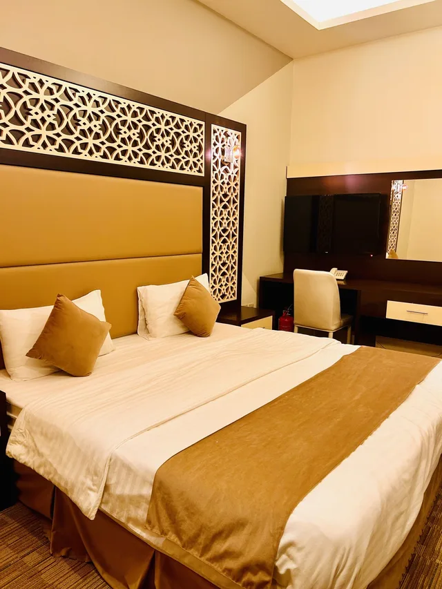 جناح عائلي بسرير مزدوج وسريرين منفصلين، Arabian Palm Hotel 3/3