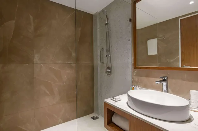 غرفة ديلوكس بسرير كينج، Hawthorn Suites by Wyndham Dwarka 5/5