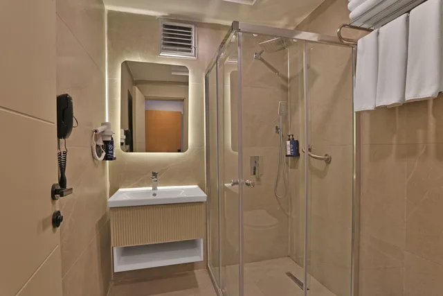 غرفة سوبيريور بسريرين منفصلين بإطلالة على الحديقة، Mesopotamia Garden Hotel 6/6
